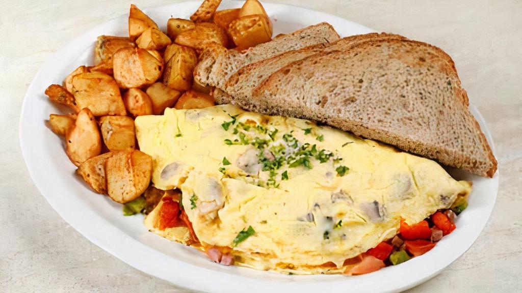 Fillmore Omelette · Three Eggs, Bell Peppers, Mushrooms, Tomatoes, Smoked Pit Ham & Swiss Cheese.  Served with Country Bread Toast & Side of Rosemary Garlic Potatoes.