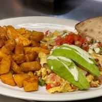 Don Moi Scrambler · Eggs, Chorizo, Onions, Bell Peppers, Pepper Jack Cheese Topped with Avocado, Salsa Fresca & ...