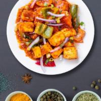 Paneer Chili · Marinated paneer cooked with house chili sauce, peppers, and onions.