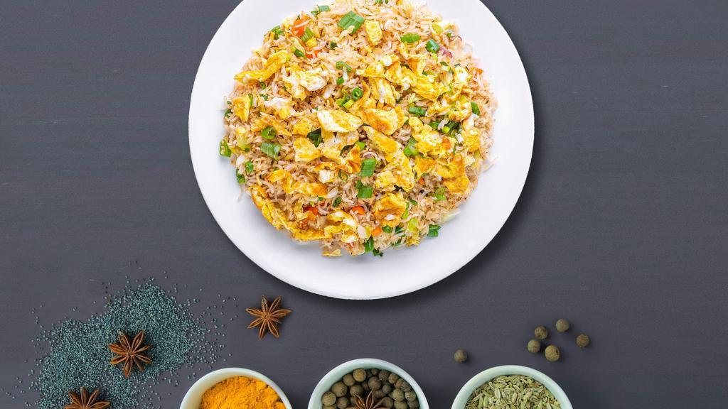 Eggilicious Fried Rice · Mouth watering spicy Sichuan peppers, garlic, eggs, and seasonings stir fried with basmati rice. Gluten-free and vegan.