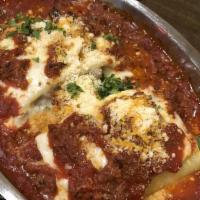 Lasagna · A classic, layered with cheese and red meat sauce.
