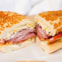 4. Mile High Pastrami · Thinly sliced eye of round pastrami piled high, Swiss cheese, garlic mayo, mustard, lettuce,...