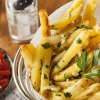 Garlic French Fries · Delicious hand-cut potatoes with garlic.