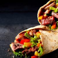 Steak Wrap · Juicy steak built with fresh veggies and lightly coated mayo on a lavash bread.