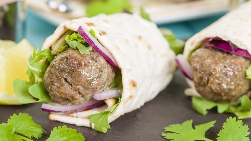 Lamb Wrap · Marinated lamb built with fresh veggies and lightly coated mayo on a lavash bread.