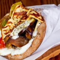 Vegetarian Gyro · Fresh gyro built with, falafel, veggies, and tzatziki sauce on thick pita bread.