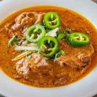 Kadai Chicken · A traditional tomato and onions curry pakistani style.