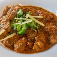 Goat Curry · Lamb cooked in a traditional blend of curry spices.