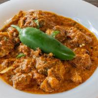 Achar Gosht · Extra spicy lamb or goat curry with roasted pepper.