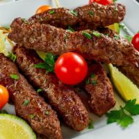 Chicken Shish Kabab · Serve with rice, hummus and bread.
