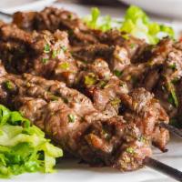 Lamb Kabab · Serve with rice, hummus and bread.