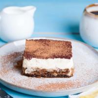 Tiramisu · Light dessert made with ladyfingers dipped in coffee, layers of fluffy mascarpone cheese and...