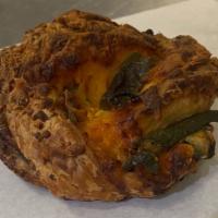 Jalapeno Cragel · Fresh Jalapenos and cheddar folded in croissant dough and cooked like a bagel.