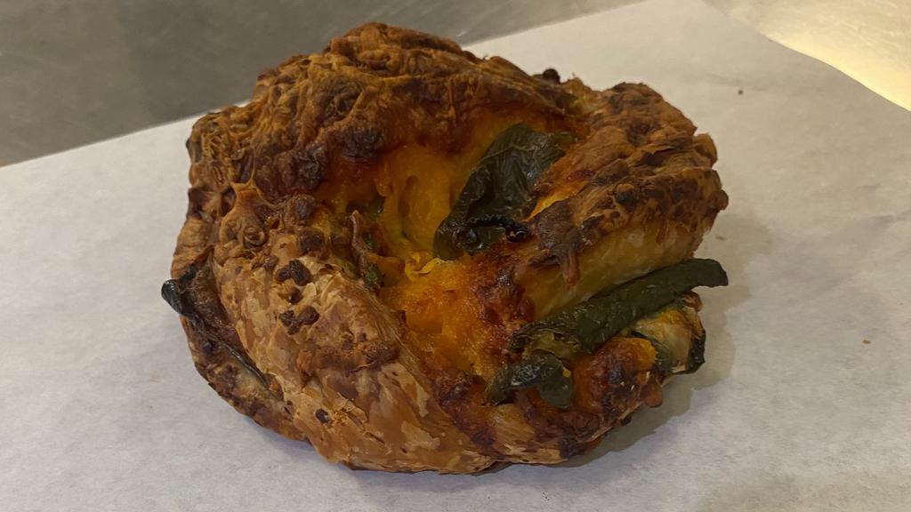 Jalapeno Cragel · Fresh Jalapenos and cheddar folded in croissant dough and cooked like a bagel.