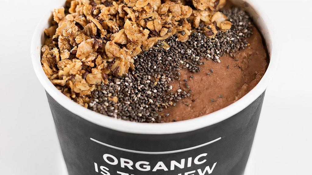 The Cold-Brew Bowl · Cold-Brewed Coffee, Banana, Cacao, Vanilla, Maple Syrup & Almond Milk. Topped with Granola, Almond Butter & Chia Seeds