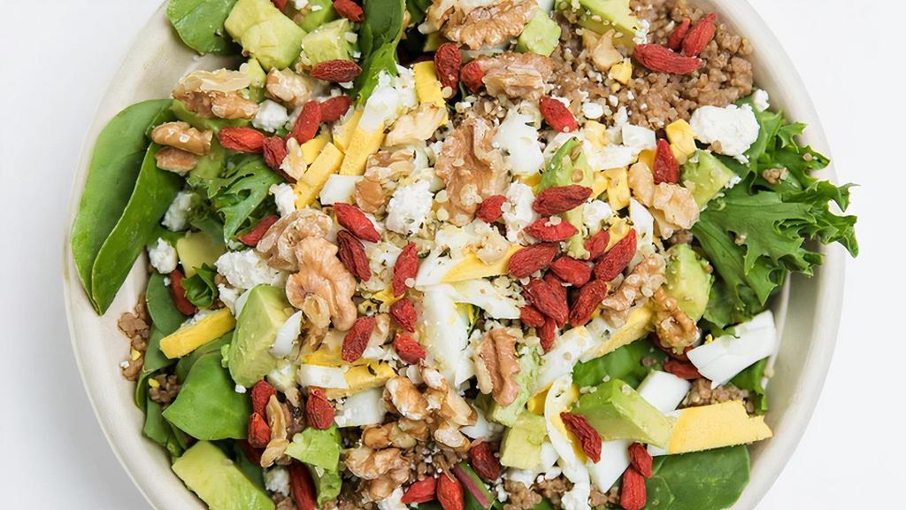 The Balanced Bowl · Spring Mix and Quinoa base, topped with Gogi Berries, Hemp Seeds, Hard-Boiled Egg, Avocado, Feta Cheese, Walnuts, and your choice of dressing.