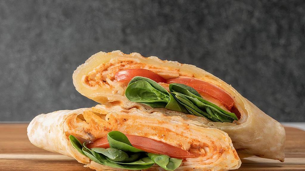 The Bbq Wrap · Toasted Flatbread Wrap, Chicken, Cheddar Cheese, Tomato, Spinach, Himalayan Pink Sea Salt, & Tessemae’s Sweet and Spicy BBQ Sauce Subject to availability. Organic turkey may be substituted for chicken.