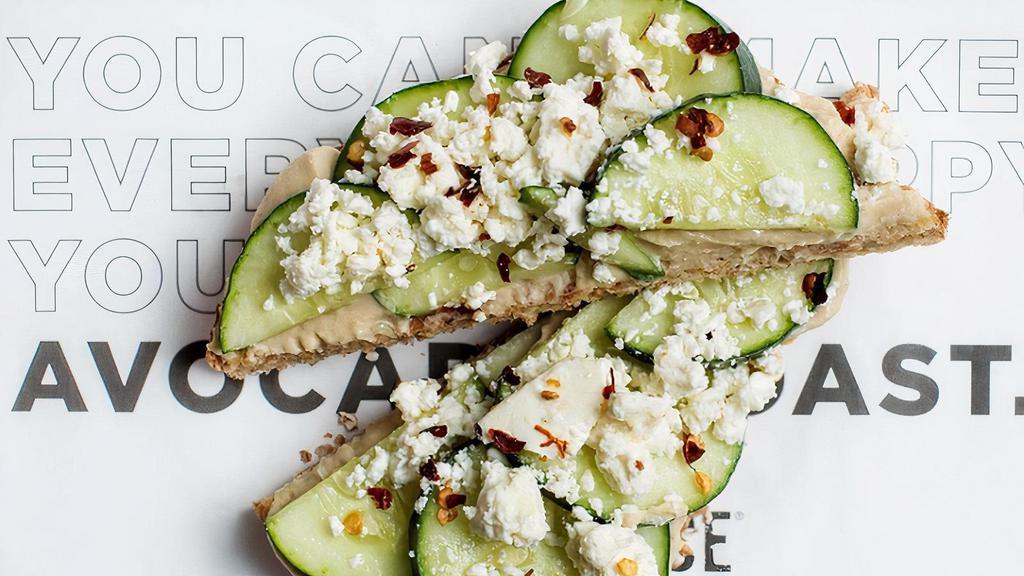 The Hummus Toast · Sprouted Toast, Hummus, Cucumber, Feta, Red Pepper Flakes, Lemon Juice . Nutritional Information Sprouted Grain/Gluten Free. Total Calories - 240/310. Calories from Fat - 90/120. Total Fat - 10/13 g. Saturated Fat - 3/5 g. Trans Fat - 0 g. Cholesterol - 10/10 mg. Sodium - 430/710 mg. Total Carbs - 28/44 g. Dietary Fiber - 4/4 g. Sugars - 4/3 g. Protein - 9/6 g