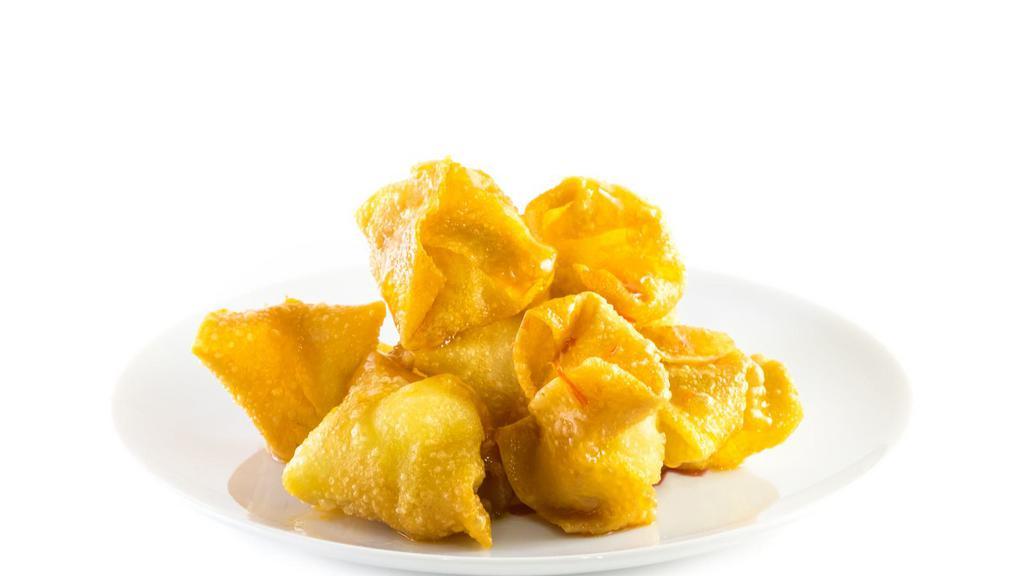 Crispy Wonton · 6 pieces of Golden delicious wontons prepared with a house special veggie filling.