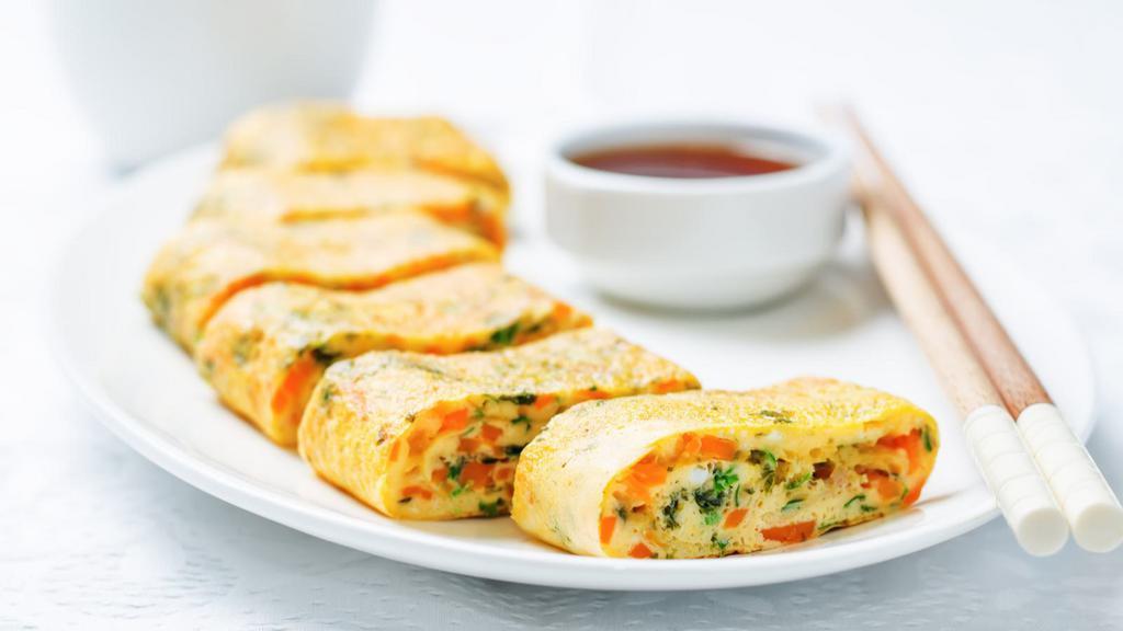 Crispy Egg Rolls · 4 pieces of Golden delicious egg rolls prepared with a house special veggie filling.