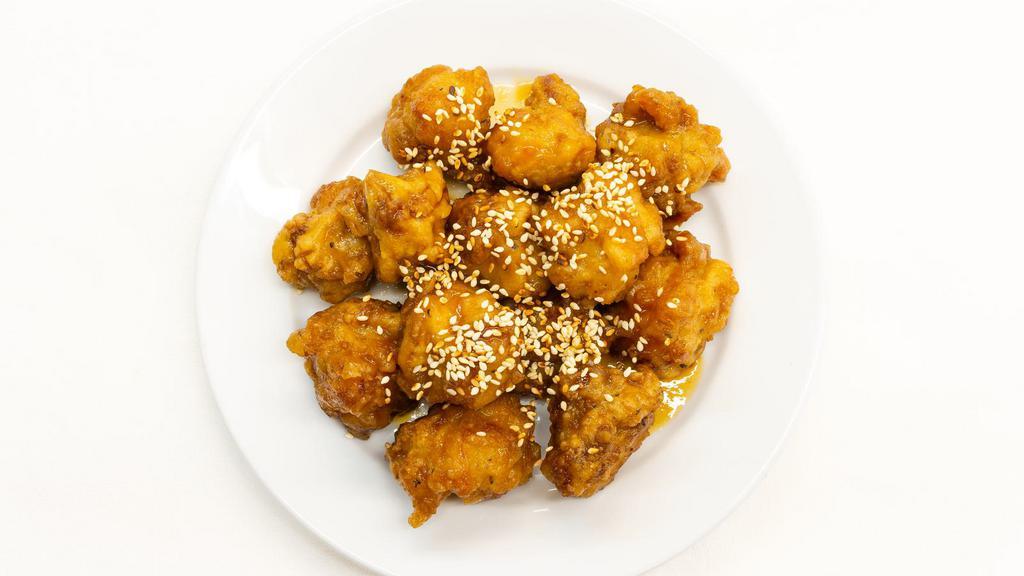 Curry Fish Ball · Delicious, deep-fried crispy fish balls, coated in a house curry paste.