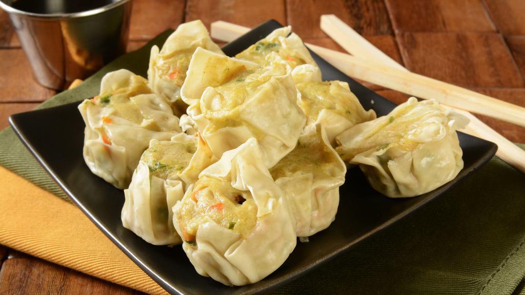 Chicken Dumplings · 12 pieces of Homemade Chicken dumplings prepared in your choice of style.