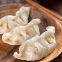 Vegetarian Dumplings · Housemade locally grown vegetable dumplings (12 pieces).