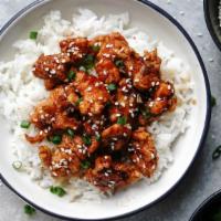 Sesame Chicken · Stir fried chicken tossed in a glaze and topped with roasted sesame seeds.