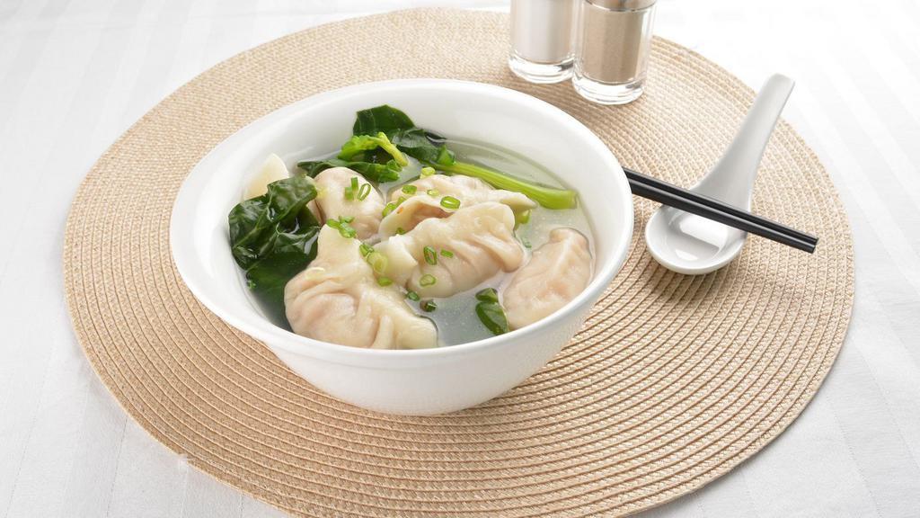Chicken & Spinach Wonton Soup · Crispy chicken wontons served in a thin broth prepared with fresh spinach leaves.