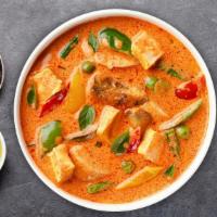 Forbidden Forest Curry · Red curry sauce with tofu, bamboo shoots, green beans, pumpkins, zucchini, mushrooms, baby c...