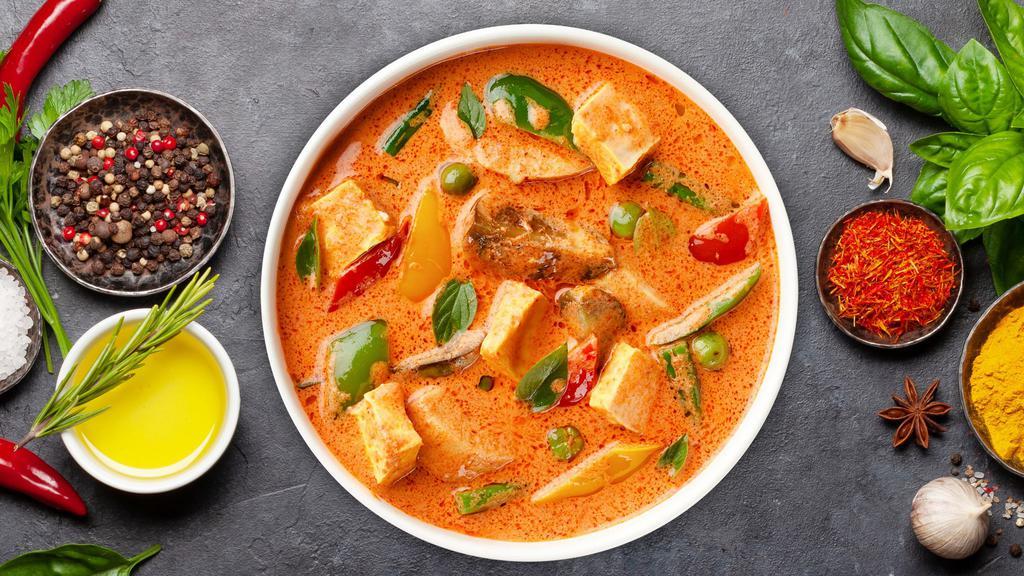 Forbidden Forest Curry · Red curry sauce with tofu, bamboo shoots, green beans, pumpkins, zucchini, mushrooms, baby corns, galangal, young green pepper, and fresh basil cooked without coconut milk.