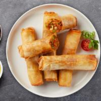 Spring Roll · Deep-fried wrapped rice paper rolls stuffed with vegetables and bean thread noodles (clear n...