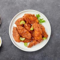 Hot Sticky Wings · Fried chicken wings served with chef's special dipping sauce.