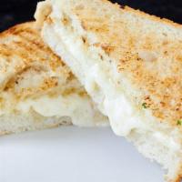 Grilled Cheese Panini · Monterey Jack and Fontina cheeses with mayo on our housemade whole wheat sourdough bread.