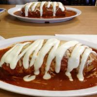 Wet Burrito · Choice of meat, rice, beans, pico de gallo, guacamole, and sour cream. Wet with a homemade s...