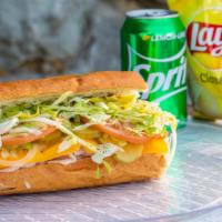 Ham Sub · Served with Swiss on a Bordenave’s roll with lettuce, tomatoes, onions, pickles, peppers, pe...