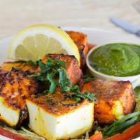 Paneer Tikka Tandoori · Indian cheese, spicy yogurt marinated, and herbs with tandoor oven-baked.