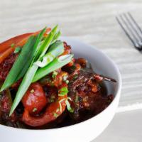 Chilli Chicken · Tossing fried boneless chicken in sweet-sour and spicy chili sauce, garnished with fresh cor...