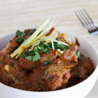 Chicken Vindaloo · Boneless chicken and potatoes cooked with special herbs and spices in thick curry sauce. Glu...