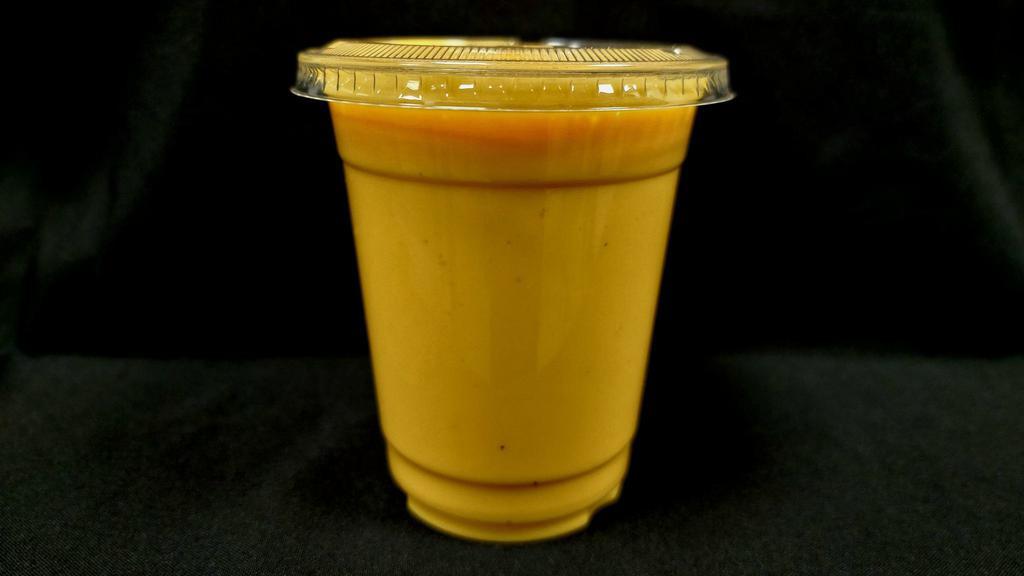 Mango lassi · Yogurt and mango-based smoothie.
