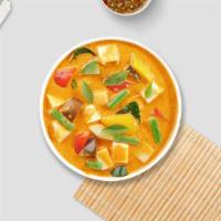Yellow Curry Chicken · Gluten-free. Mild curry with coconut milk and slow-cooked chicken, onions, carrots and potat...