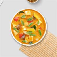 Massaman Curry Beef · Thai style mild with tender chunks of slow-cooked beef in coconut milk, carrots, potatoes an...