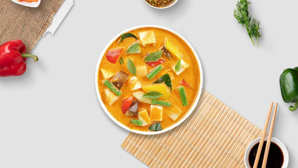 Massaman Curry Beef · Thai style mild with tender chunks of slow-cooked beef in coconut milk, carrots, potatoes and peanuts.