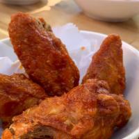 Heaven Wings · Un-Breaded Large Wings, House Brine,Serves with Celery and Blue Cheese BBQ/Buffalo/Thai Chil...