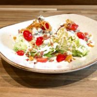Parkside Wedges · Fresh Iceberg Lettuce, Grape and Cherry Tomatoes, Blue Cheese Crumbles, Bacon bits and Crips...