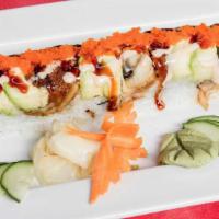 201. Dragon Roll · Tempura shrimp and cucumber topped with eel, avocado and fish roe.