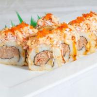 209. Dynamite Roll · Tempura spicy tuna roll topped with fish roe and chef's special sauce.