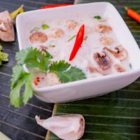 Coconut Milk Soup (Tom Kha) · Coconut milk soup with mushrooms, galangal, kaffir lime leaves, lime juice, chili paste, gre...