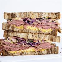 Marble Rye · hot pastrami, Swiss, spicy brown mustard, house aioli, Cole slaw
