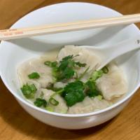 Pork & Chive Dumpling Soup (6 Pc) · Dumplings with a  pork, chive and napa cabbage filling, served with a clear broth and vinega...
